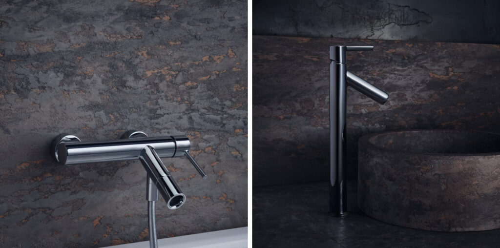 Armatura łazienkowa Philippe Starck – minimalistyczne baterie umywalkowe i wannowe w nowoczesnym wnętrzu z ciemnym kamieniem